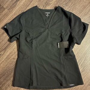 Jaanuu Women’s black Scrub Set. Medium top, medium petite joggers.